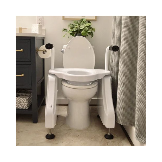 Siège élévateur de toilettes électrique Lofoten posé sur WC avec 2 poignées