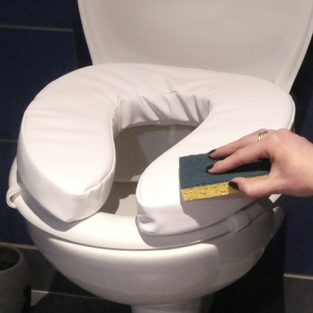 Rehausseur de toilettes rembourré