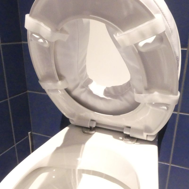 Rehausseur de toilettes rembourré